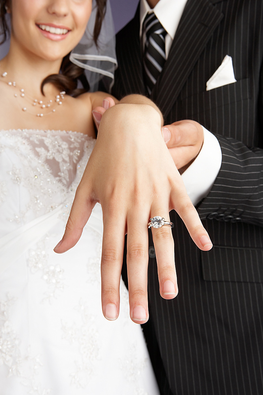 Showing off the wedding ring